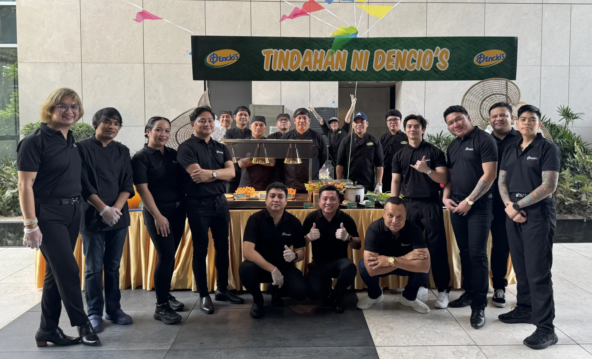 Dencio’s UAE team photo showcasing staff members and welcoming work environment.